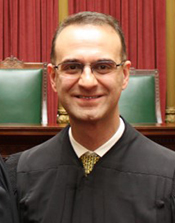 Hon. Kuyomars "Q" Golparvar